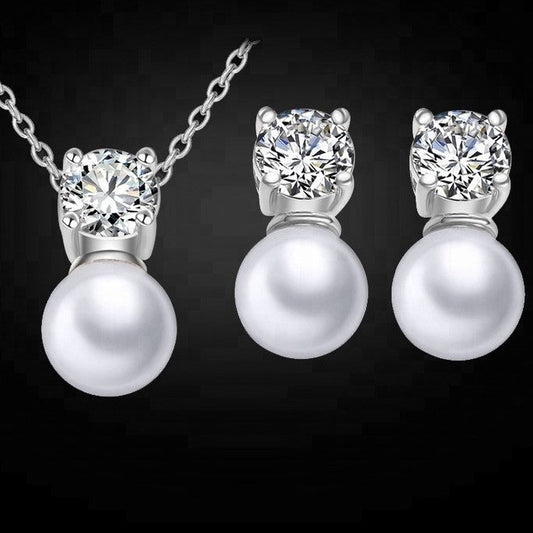 Nevya Pearl & Solitaire Shaped Crystal Stud Earrings & Pendant Necklace Set