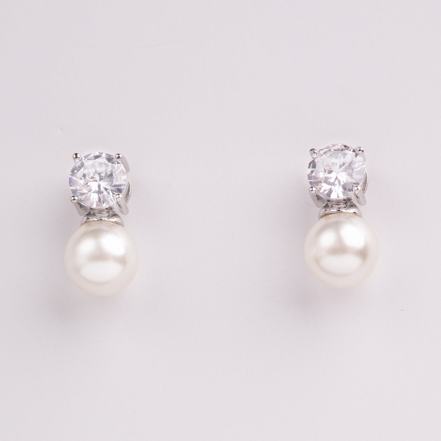 Nevya Pearl & Solitaire Shaped Crystal Bridal Stud Earrings